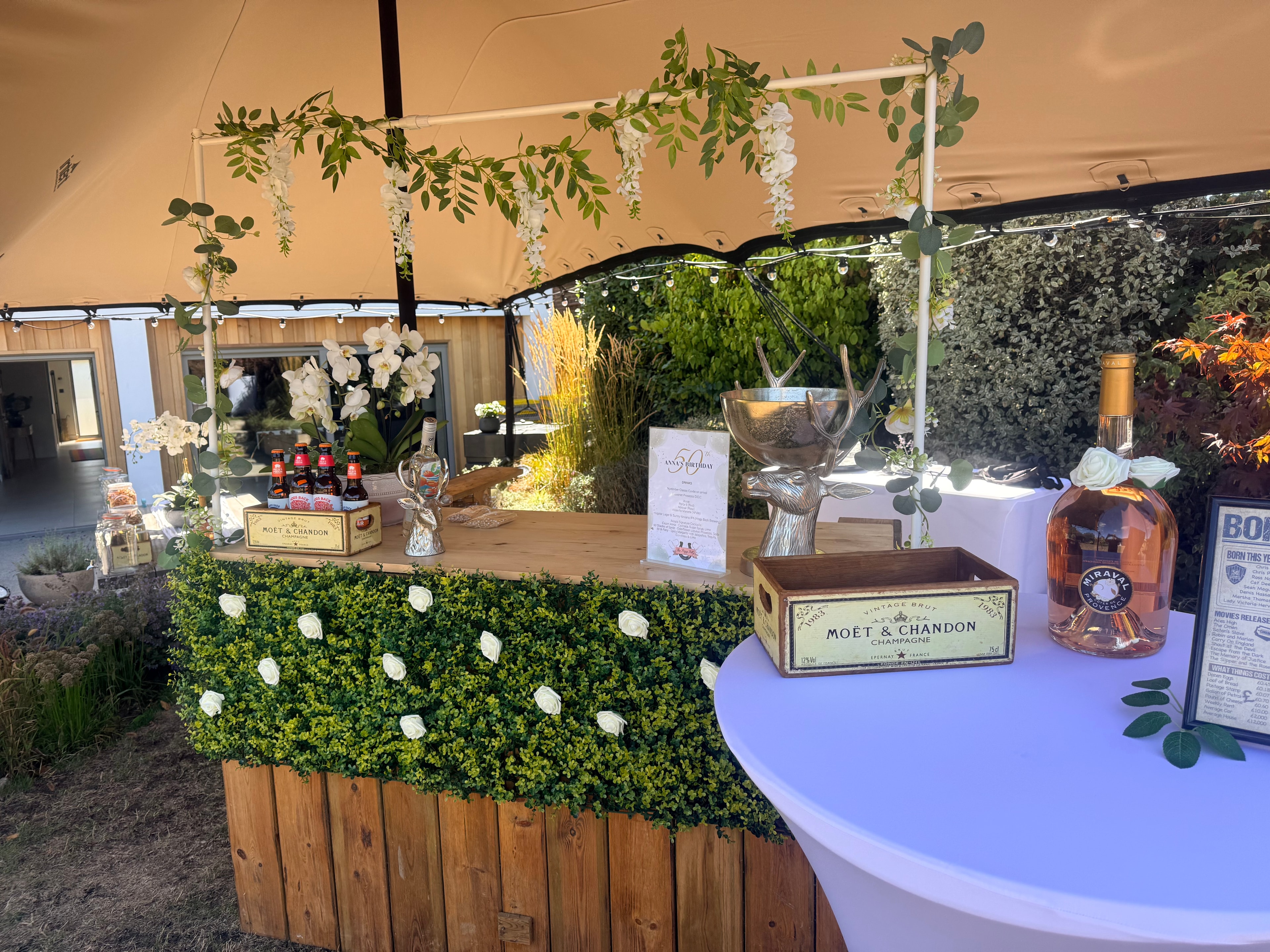Full bar setup with flowers